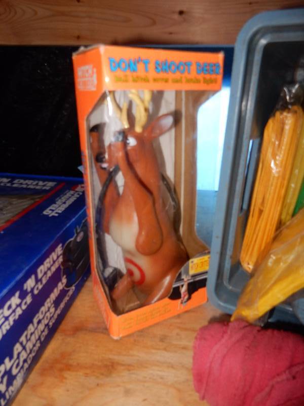 lot 87 image: Misc. Automotive cleaning items.. How about the Deer Theme, trailer hitch ball cover. Lights up with the brakes..