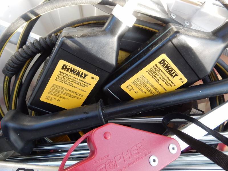 lot 102 image: Lot of power washer hoses, nozzels, extensions, liquids.. Please insepct.