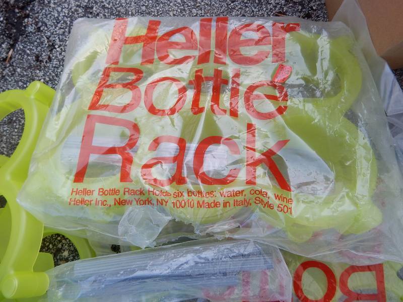 lot 104 image: 6, Heller Bottle Racks.. Not sure how these work, but it seems like they are all there..