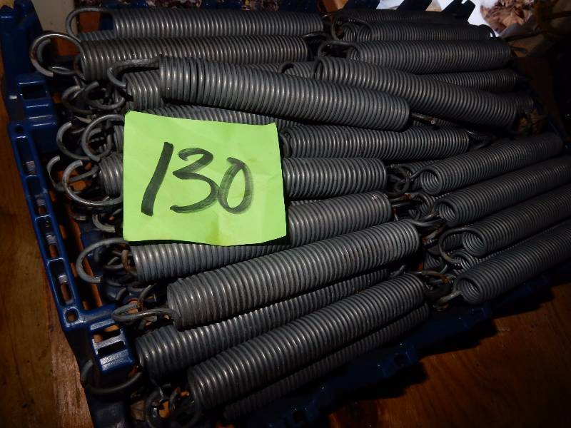 lot 130 image: Large quantity of heavy duty springs.