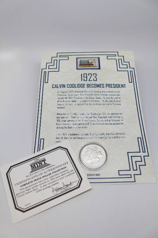 1923-D Peace Silver Dollar & Stamp Commemorative Book Collection