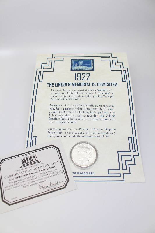 1922-S Peace Silver Dollar & Stamp Commemorative Book Collection