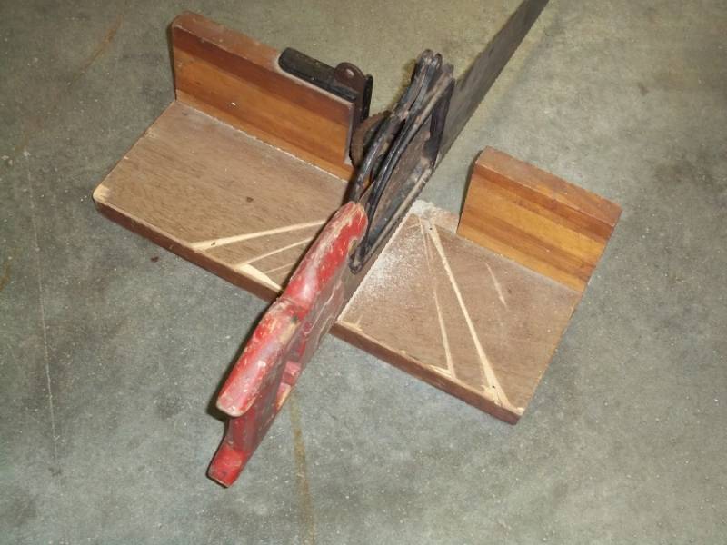 Vintage miter box with saw