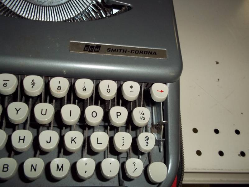 Vintage portable typewriter with case