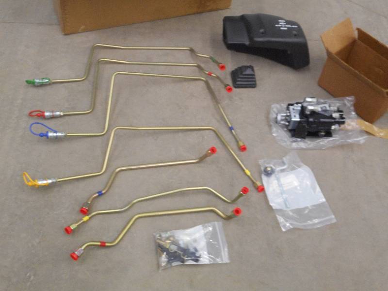 lot 6 image: Unused TractorLoader Control Set ...