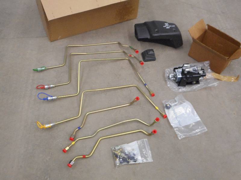 lot 10 image: Unused TractorLoader Control Set ...