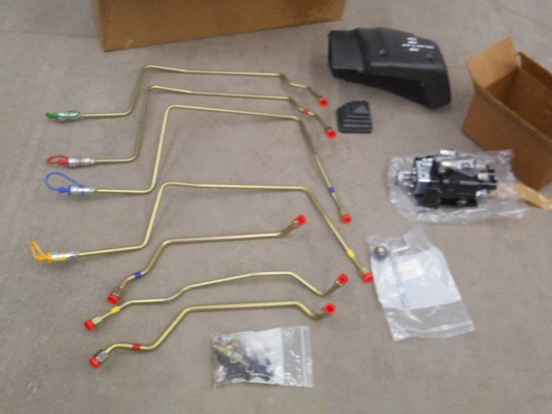 lot 11 image: Unused TractorLoader Control Set ...