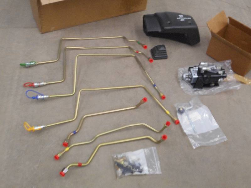 lot 12 image: Unused TractorLoader Control Set ...