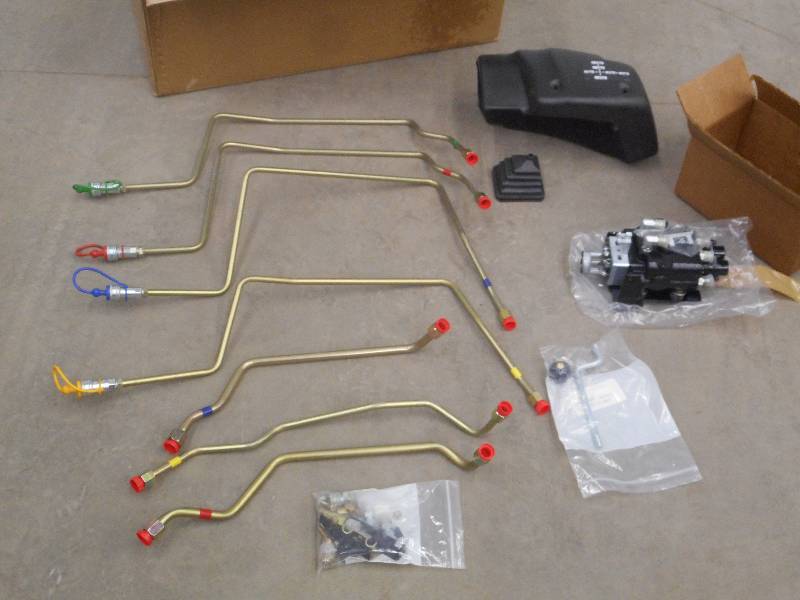 lot 13 image: Unused TractorLoader Control Set ...