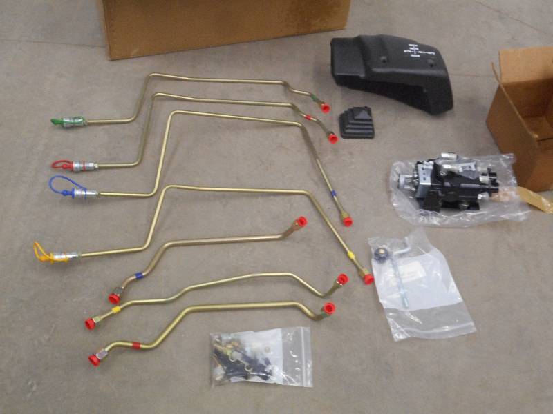 lot 14 image: Unused TractorLoader Control Set ...