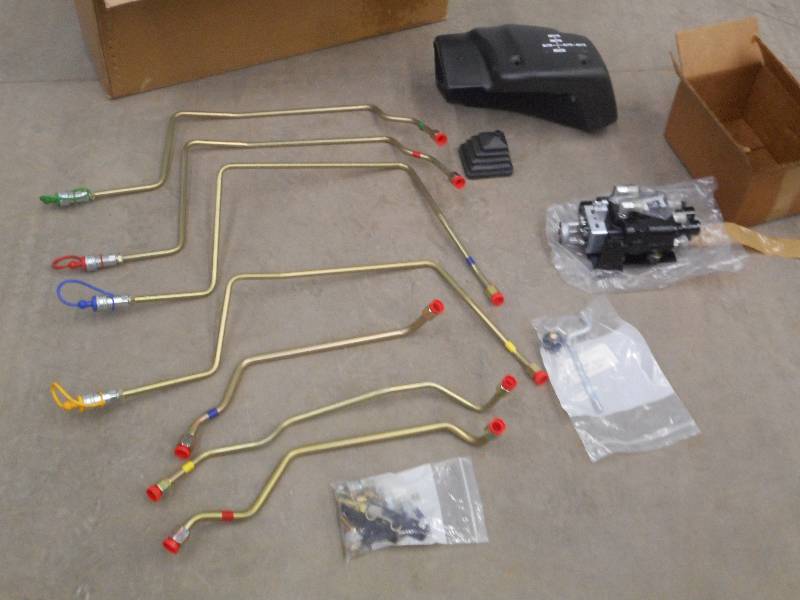 lot 15 image: Unused TractorLoader Control Set ...