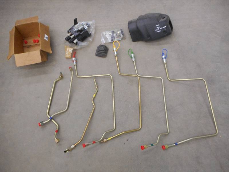 lot 16 image: Unused TractorLoader Control Set ...