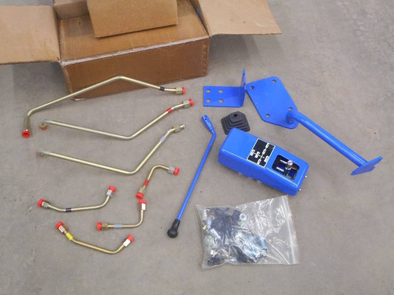 lot 42 image: Unused Tractor Loader Control Set ...