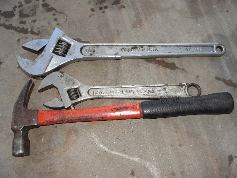 lot 9 image: 16 and  12 Adjustable Craftsman Wrench and Hammer