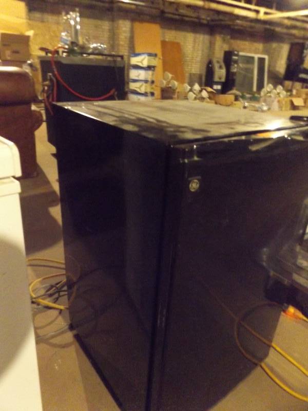 General Electric mini refrigerator, 20W x 22D x 32H (some dents and scratches)