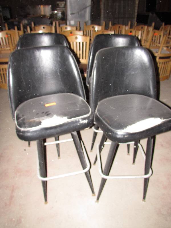 Set of 4 swivel bar stools (torn upholstery)