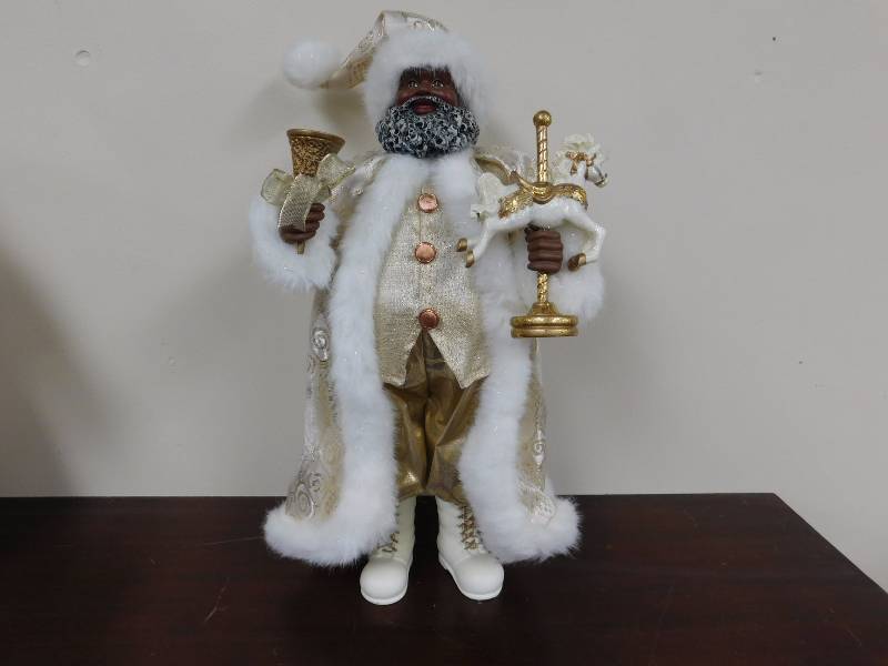 lot 17 image: Black Santa wearing gold was used as a model for Christmas paintings