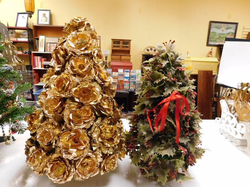 lot 21 image: two tabletop Christmas trees used as models for oil paintings