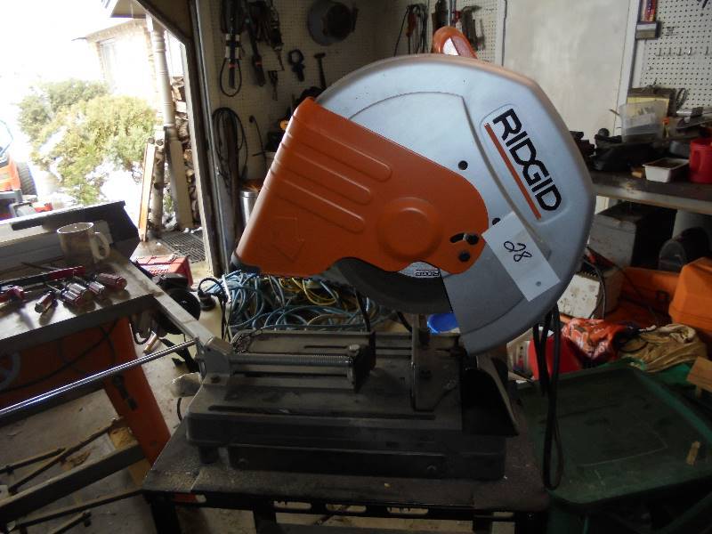 lot 28 image: RIGID Shop Saw on Metal Cart
