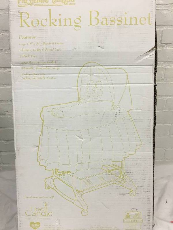 lot 20 image: Delta Jungle RockerBassinet