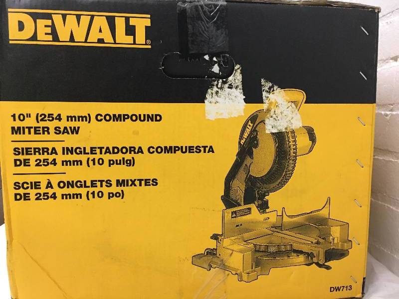 lot 33 image: DeWalt 10 Compound Miter Saw
