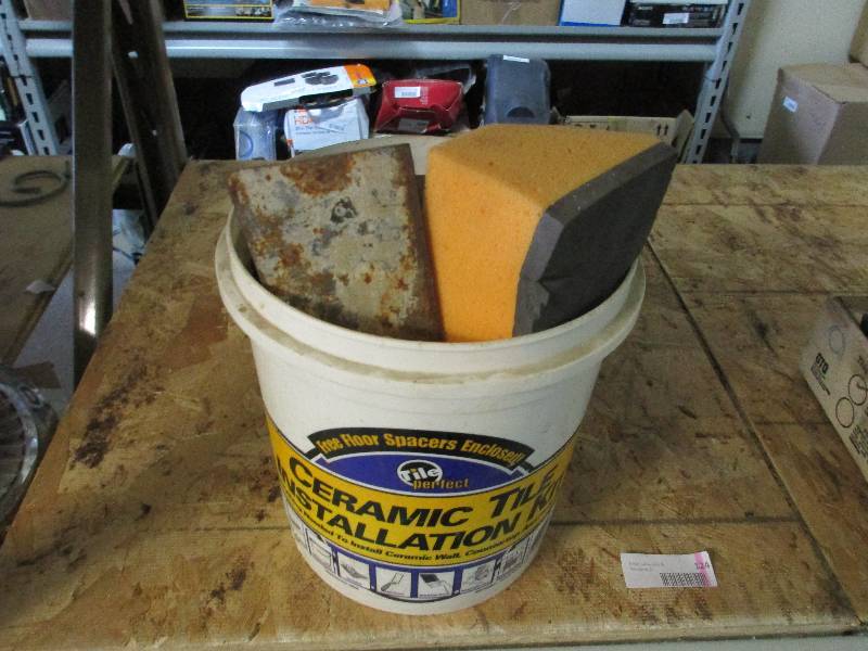 Bucket of tiling tools