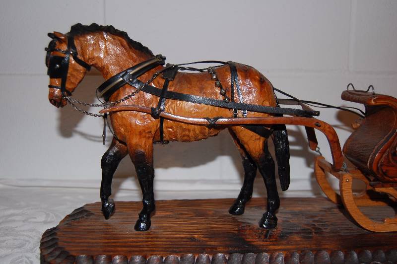 lot 88 image: Hand Carved Wooden Horse and Sleigh
