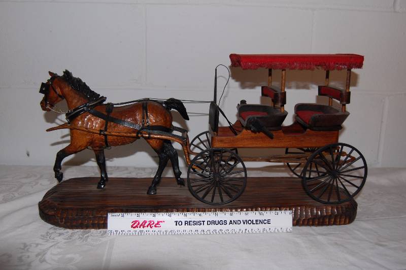 lot 91 image: Hand Carved Wooden Horse and Surry