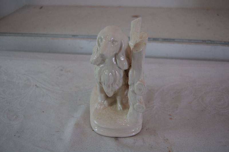 lot 114 image: Ceramic Dog Statue