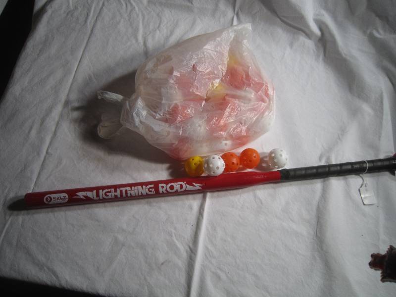 Bat and Wiffle Balls great for practicing hitting