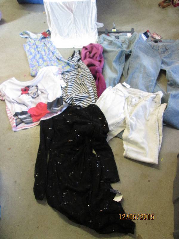 mixed lot of brand new clothes vari...