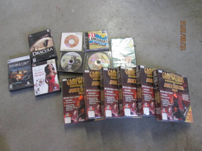 mixed lot of game guides, xbox game...