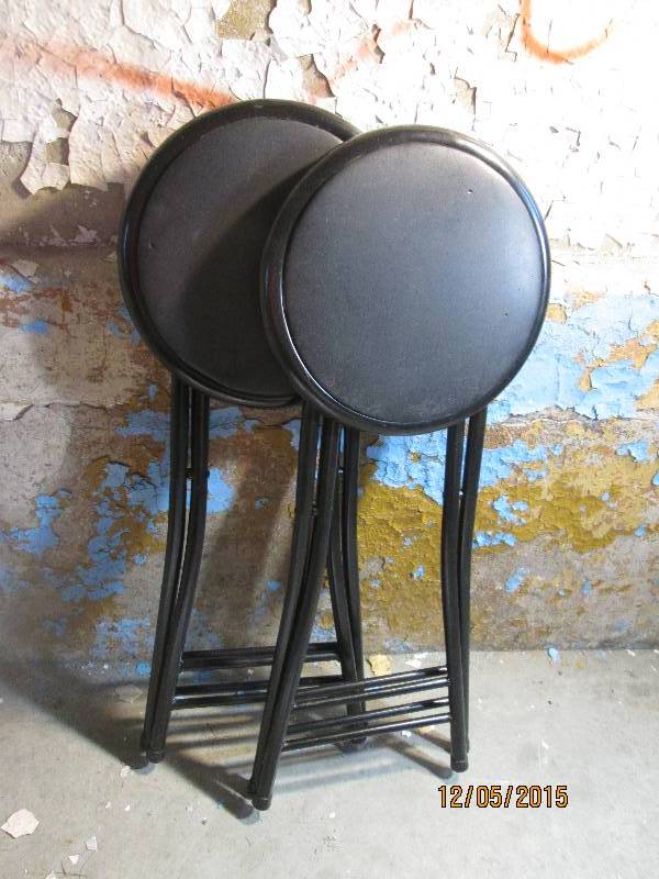 2 black metal stools ...
