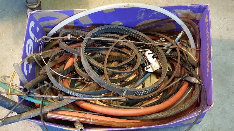 lot 290 image: Group of Hoses, Belts, and a Dipstick
