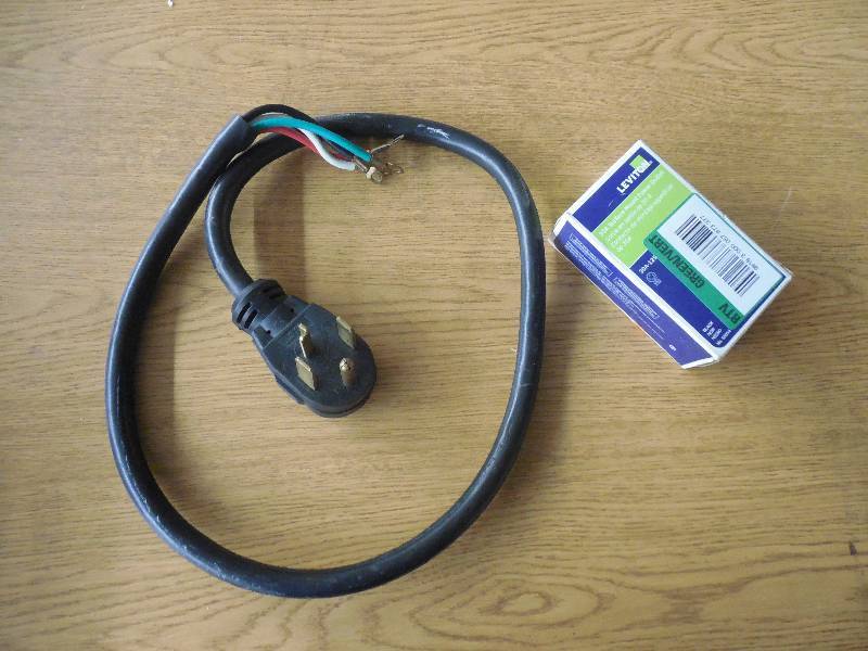 lot 11 image: 110V STOVE RANGE ADAPTER AND OUTLET