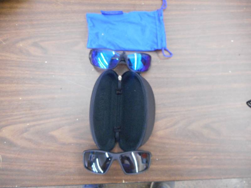 lot 22 image: 2 SETS OF POLARIZED SUNGLASSES AND CARRYING CASE