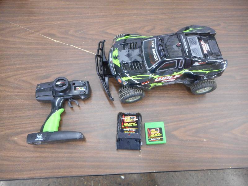 lot 60 image: New Bright 112 (14) RC PRO WOLF, Flat Track Racer- All About Speed
