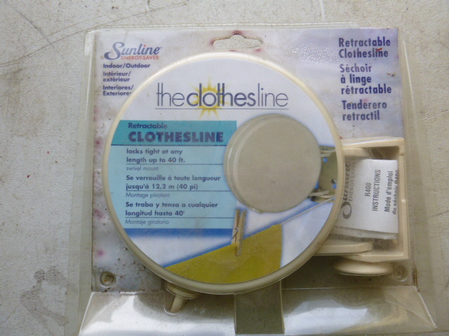 lot 49 image: Sunline IndoorOutdoor Clothes Line