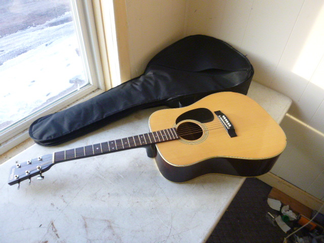 lot 105 image: Gilbert Acoustic Guitar