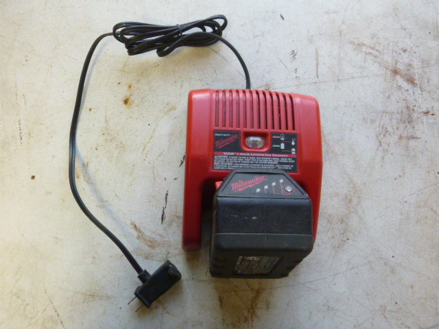 lot 114 image: Milwaukee Lithium Battery and Charger