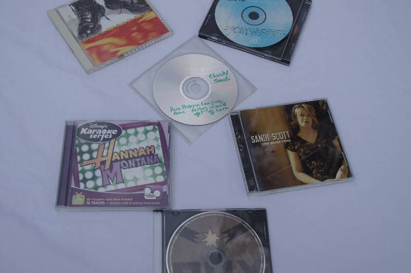 Lot of CDs including one Karaoke