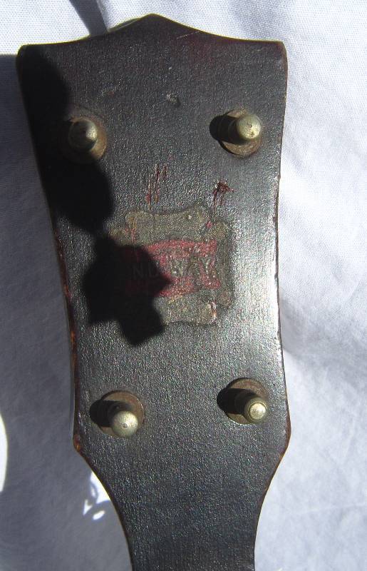 Vintage Pony Banjo with artistic work on hide.