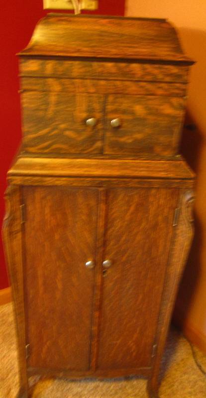 Antique Oak Victrola with Records.