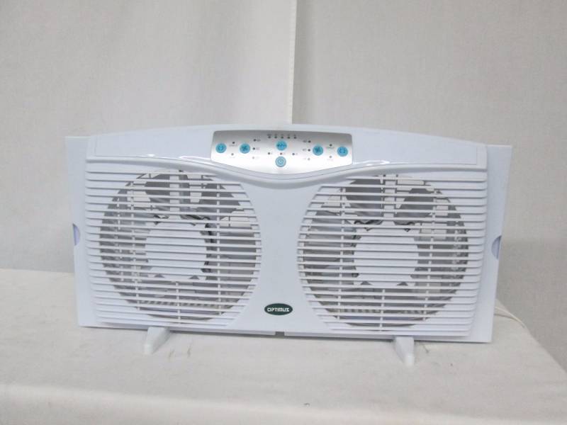 lot 15 image: Optimus Electrically Reversible Twin Window Fan