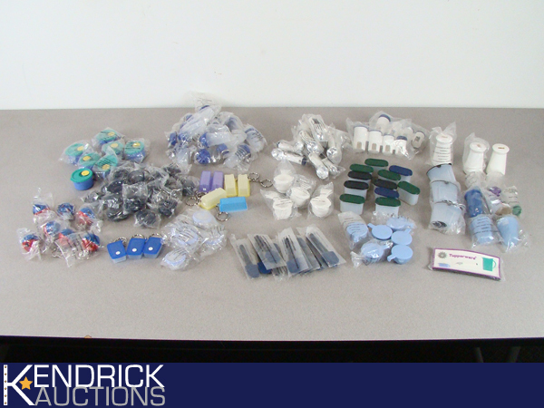 Large Lot of NEW Tupperware Keychains, Fridge Magnets, etc.