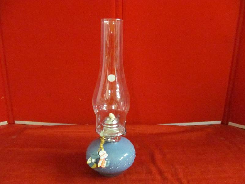 lot 30 image: blue glass oil lamp