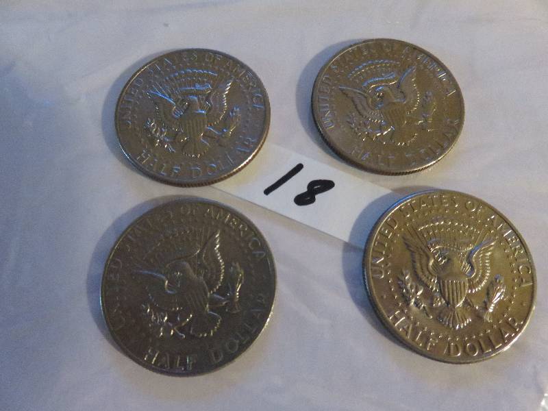 Lot of (4) Kennedy Half Dollars