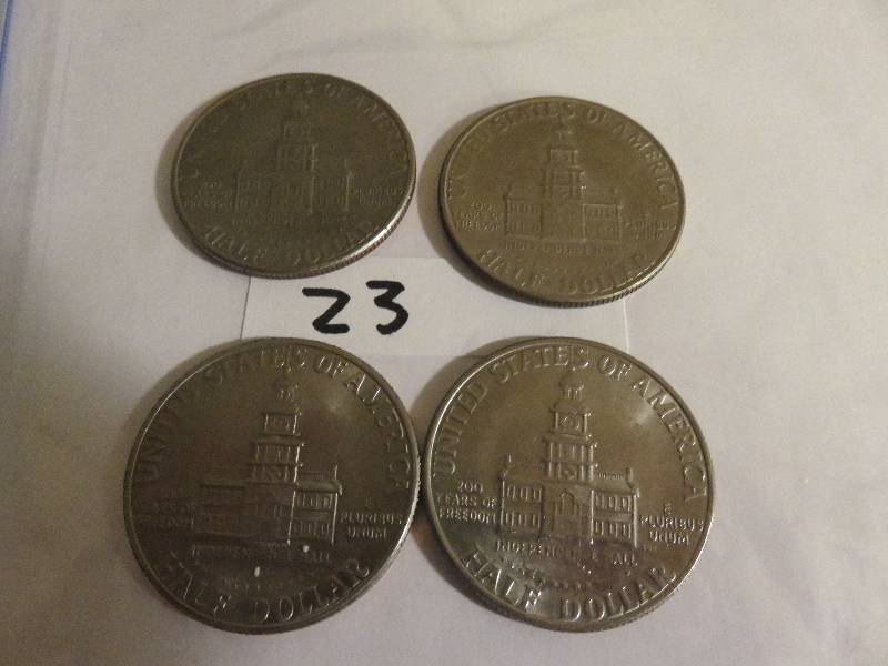 Lot of (4) Kennedy Half Dollars