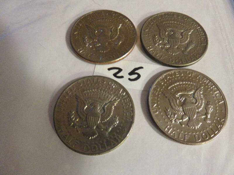 Lot of (4) Kennedy Half Dollars