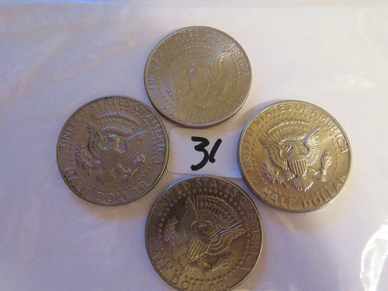 Lot of (4) Kennedy Half Dollars